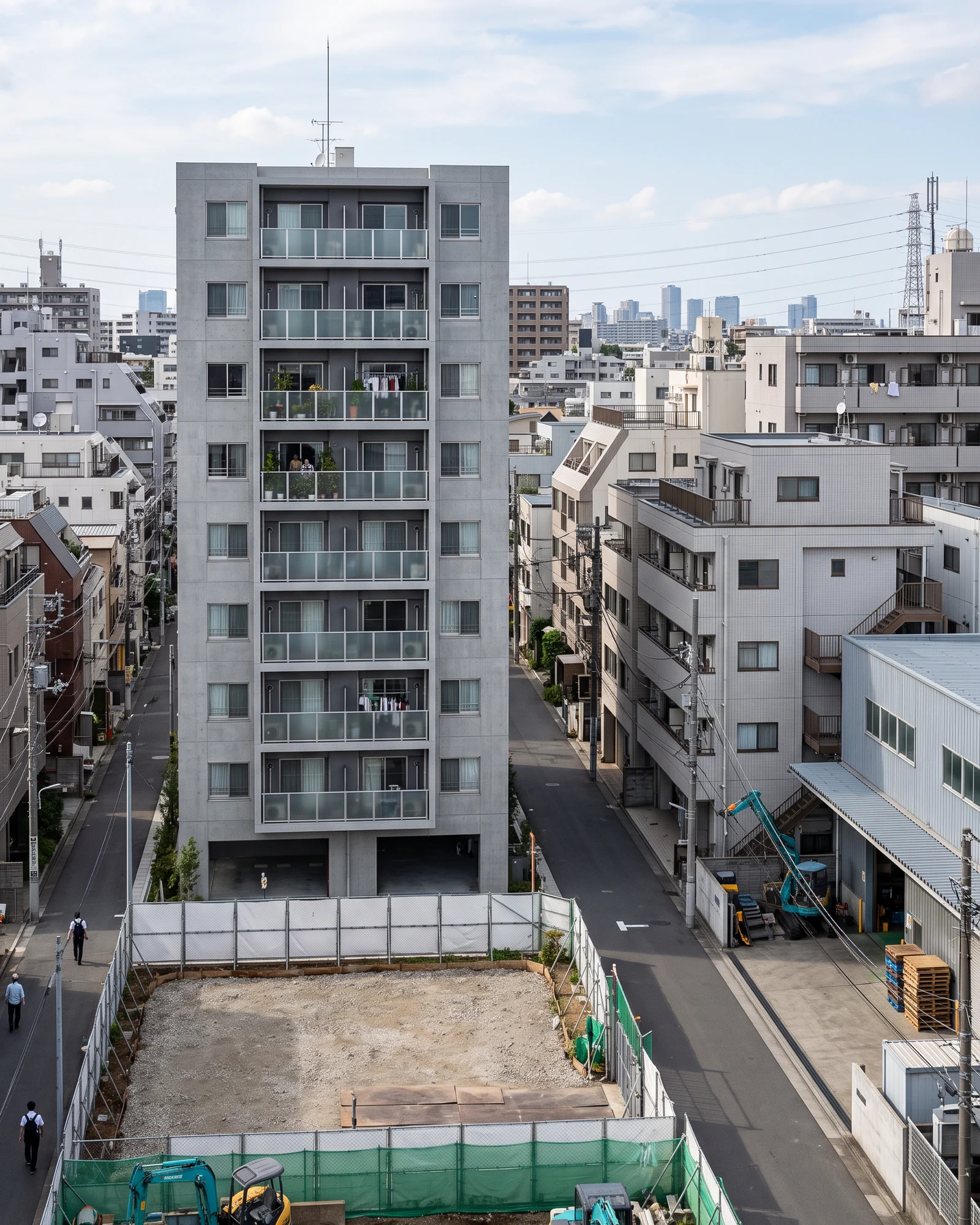 マンション開発用地と集合住宅、収益不動産が広がる都市の不動産資産